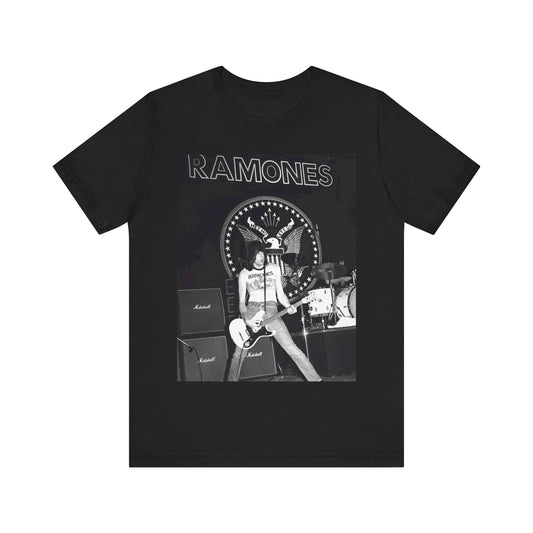 A black graphic t-shirt featuring a graphic of the Ramones with a cool NYC punk scene aesthetic.