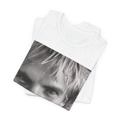 A black graphic t-shirt featuring a wild photo graphic of Sting.