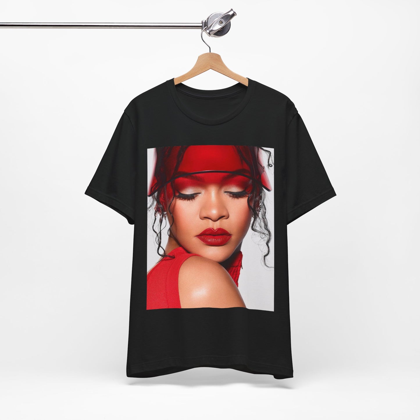 A black graphic t-shirt featuring a casual pop fan graphic of Rihanna.