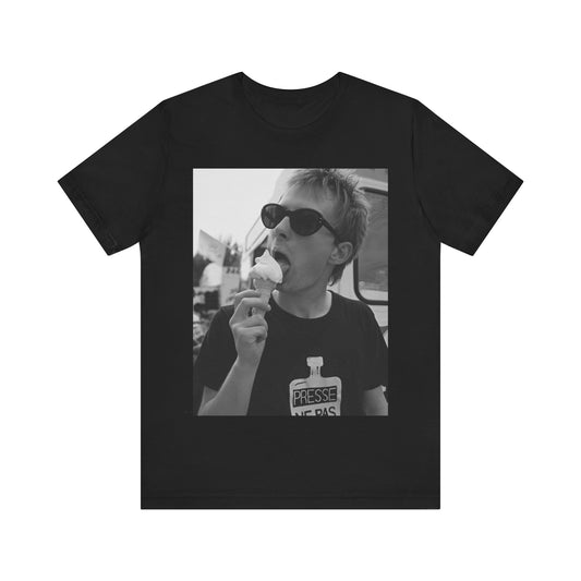 A black graphic t-shirt featuring a graphic of Thom Yorke from Radiohead with an ice cream cone.