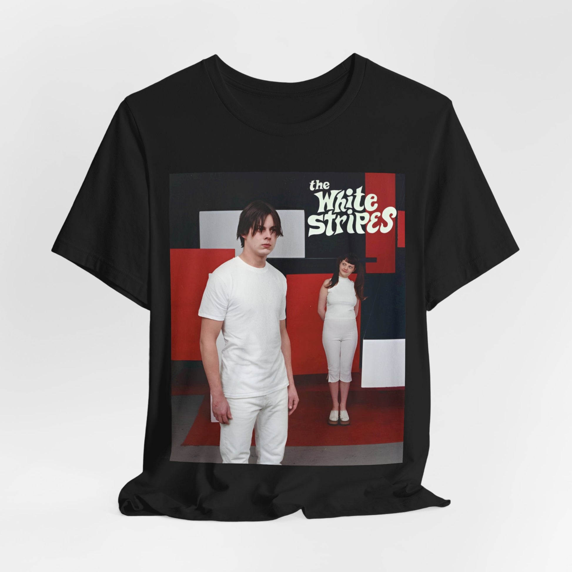 A black graphic t-shirt featuring a red and white aesthetic graphic of The White Stripes.