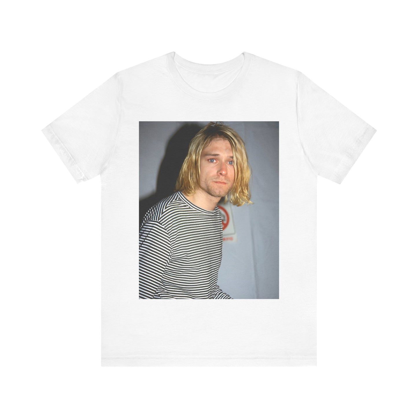 A black graphic t-shirt featuring a 90s photo portrait of Kurt Cobain from Nirvana.