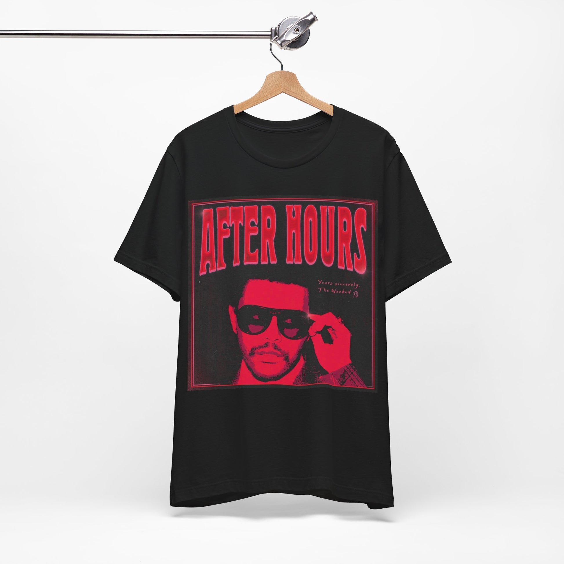 A black graphic t-shirt featuring a retro graphic related to The Weeknd's 'After Hours' album.