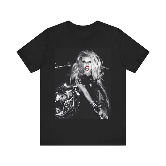 A black graphic t-shirt featuring a vintage black and white pop icon graphic of Lady Gaga.