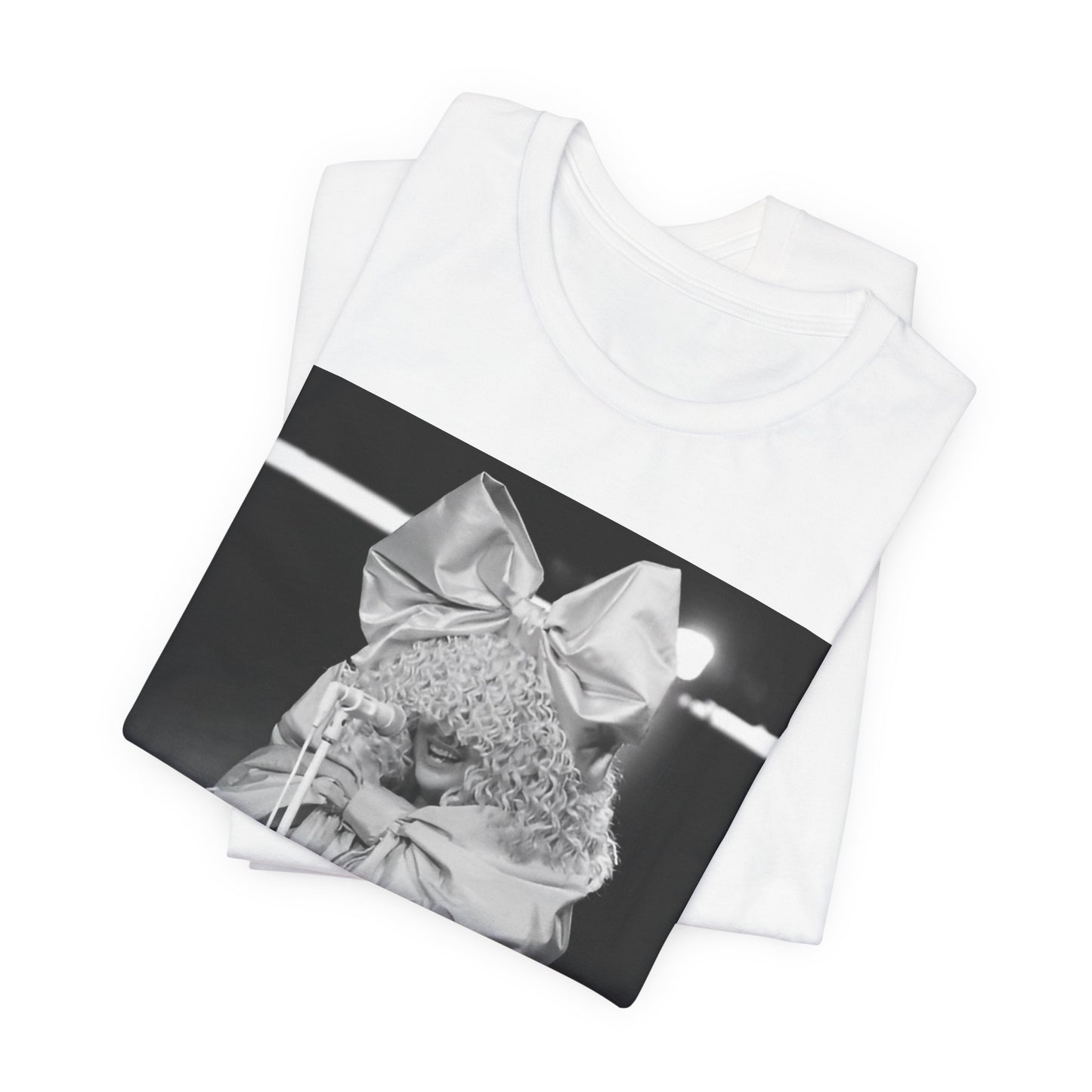 A black graphic t-shirt featuring a black and white, monochrome graphic or photo of Sia.