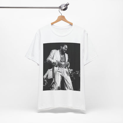 A black graphic t-shirt featuring a 70s Motown concert graphic of Marvin Gaye.