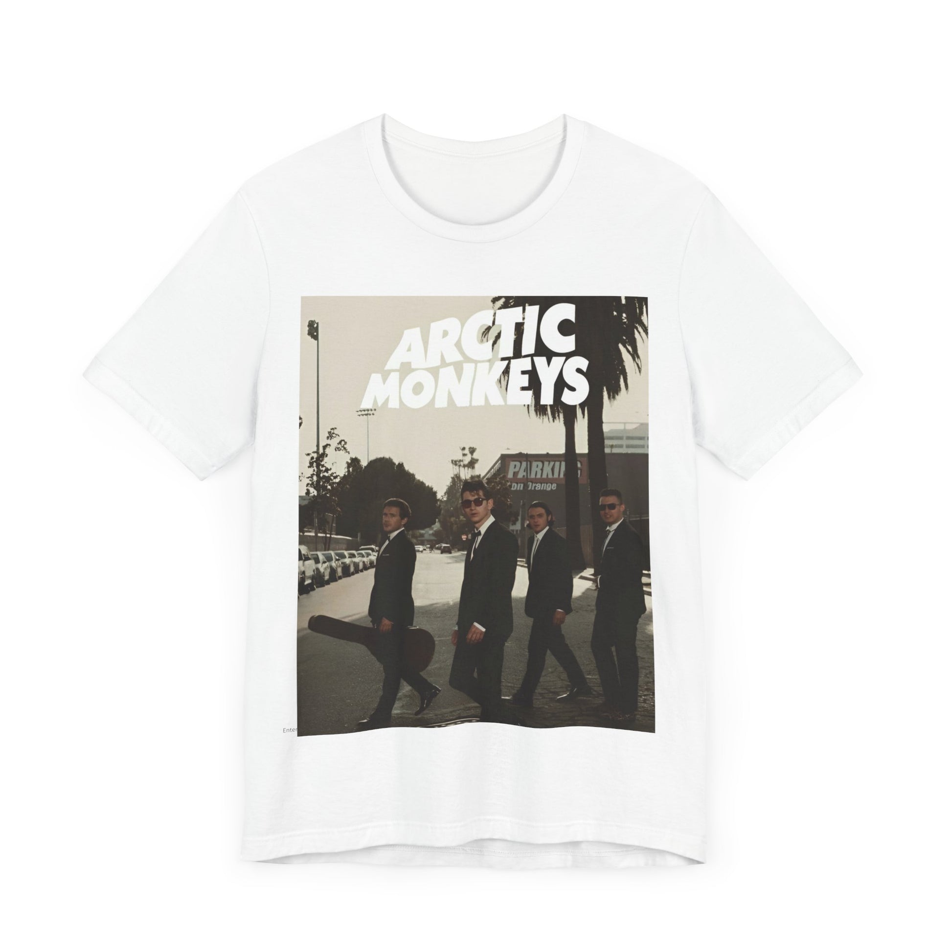 A black graphic t-shirt featuring Arctic Monkeys in a pose or setting similar to the iconic 'Abbey Road' album cover.