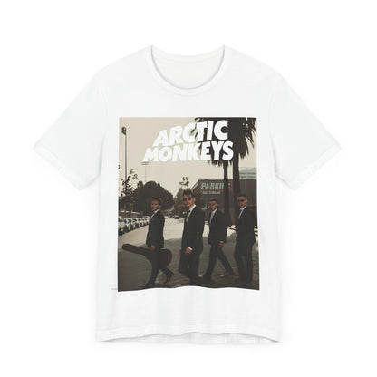 A black graphic t-shirt featuring Arctic Monkeys in a pose or setting similar to the iconic 'Abbey Road' album cover.