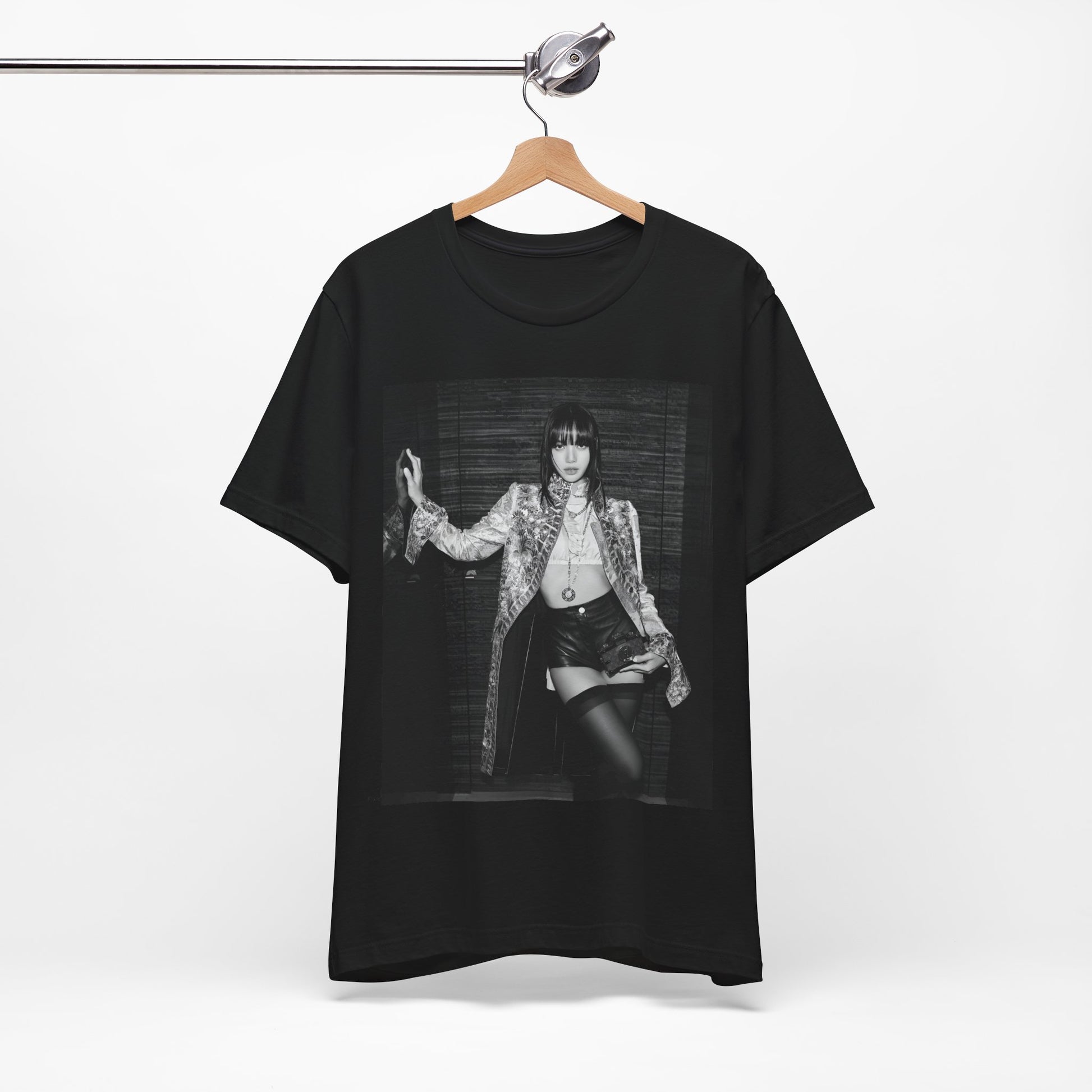 A black graphic t-shirt featuring a black and white, monochrome graphic or photo of Lisa.
