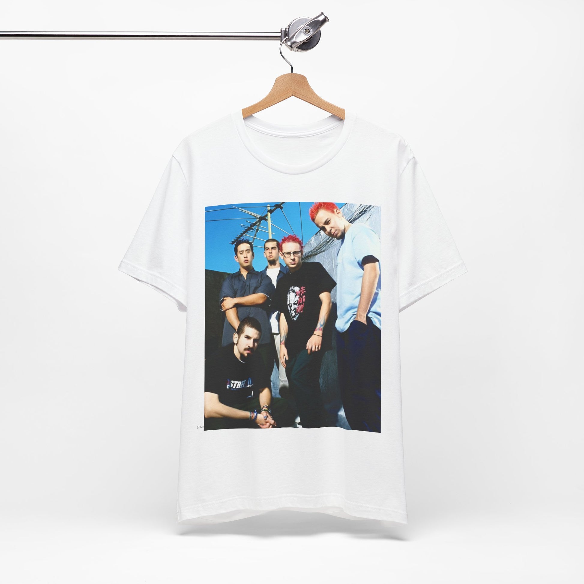 A black graphic t-shirt featuring a graphic of Linkin Park as a global nu rock phenomenon.