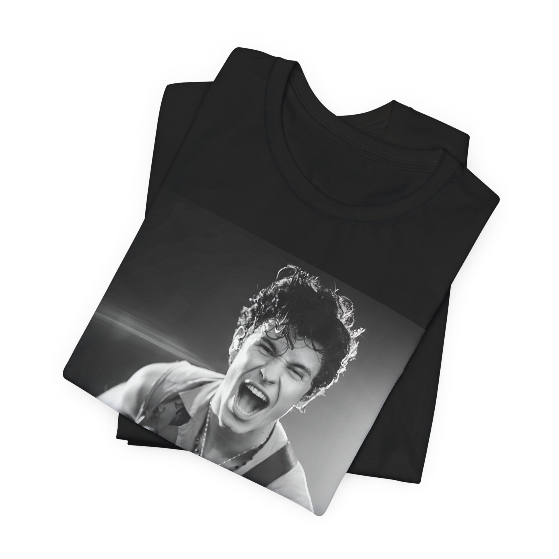 A black graphic t-shirt featuring a black and white photo of Shawn Mendes, emphasizing his charm.