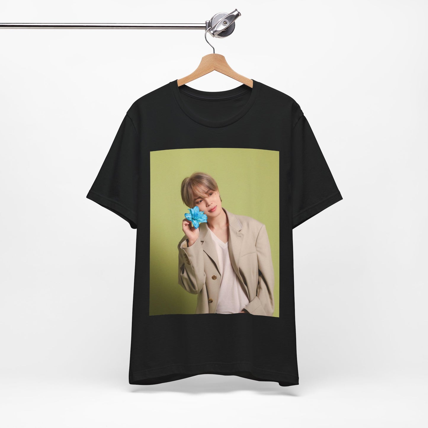 A black graphic t-shirt featuring a vintage K-Pop aesthetic graphic of Jimin.