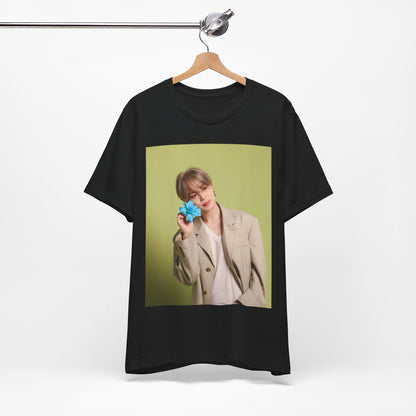 A black graphic t-shirt featuring a vintage K-Pop aesthetic graphic of Jimin.