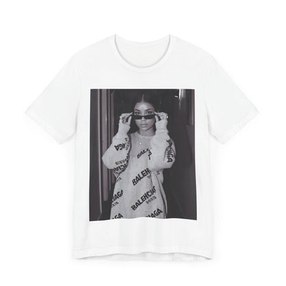 A black graphic t-shirt featuring a black and white, monochrome graphic or photo of Jhene Aiko.