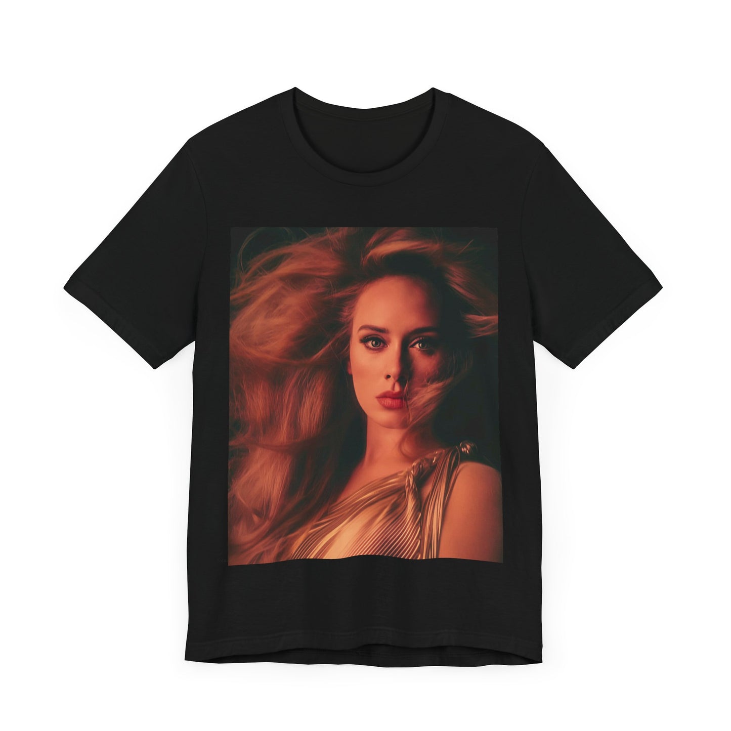 A black graphic t-shirt featuring a glamorous portrait of Adele wearing a golden gown, with voluminous hair, bathed in warm lighting, giving an editorial look.