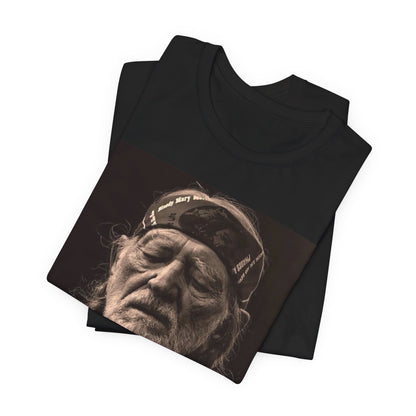 A black graphic t-shirt featuring a graphic of Willie Nelson with his iconic braids style.