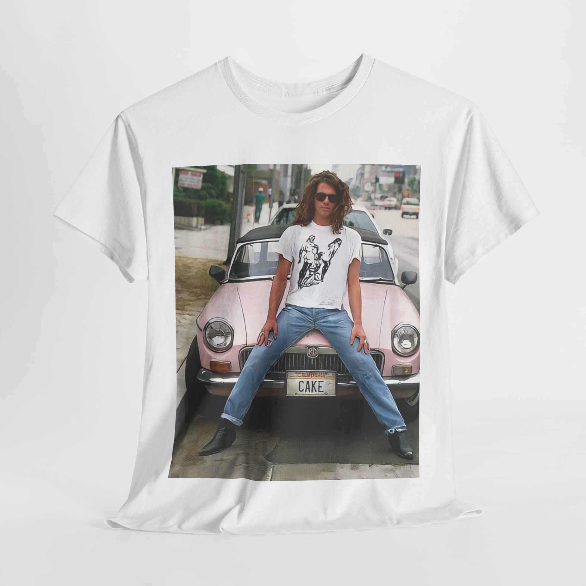 A black graphic t-shirt featuring a vintage photo of INXS band members with a classic car.