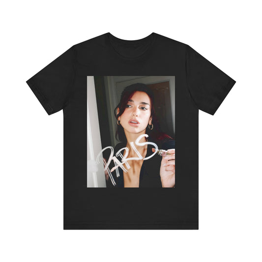 A black graphic t-shirt featuring a graphic of Dua Lipa, possibly with Parisian elements or a 'Paris' theme.