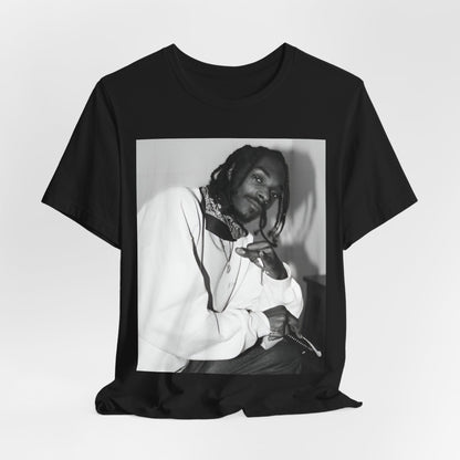 A black graphic t-shirt featuring a black and white hip hop graphic or photo of Snoop Dogg.