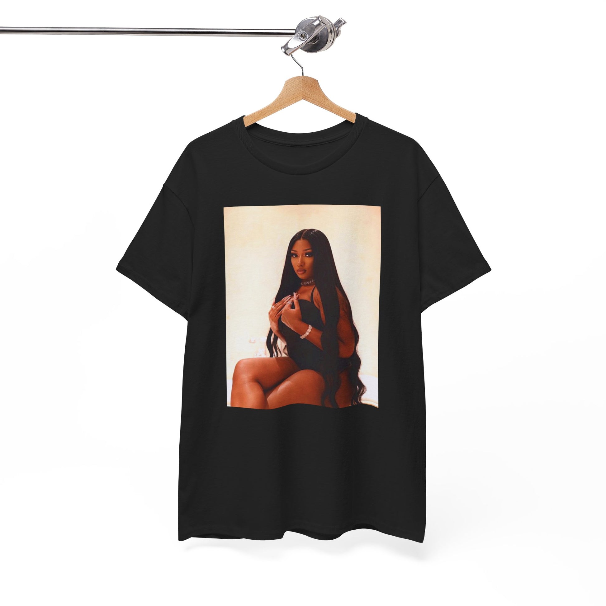 A black graphic t-shirt featuring a graphic of Megan Thee Stallion as the Queen of Rap.