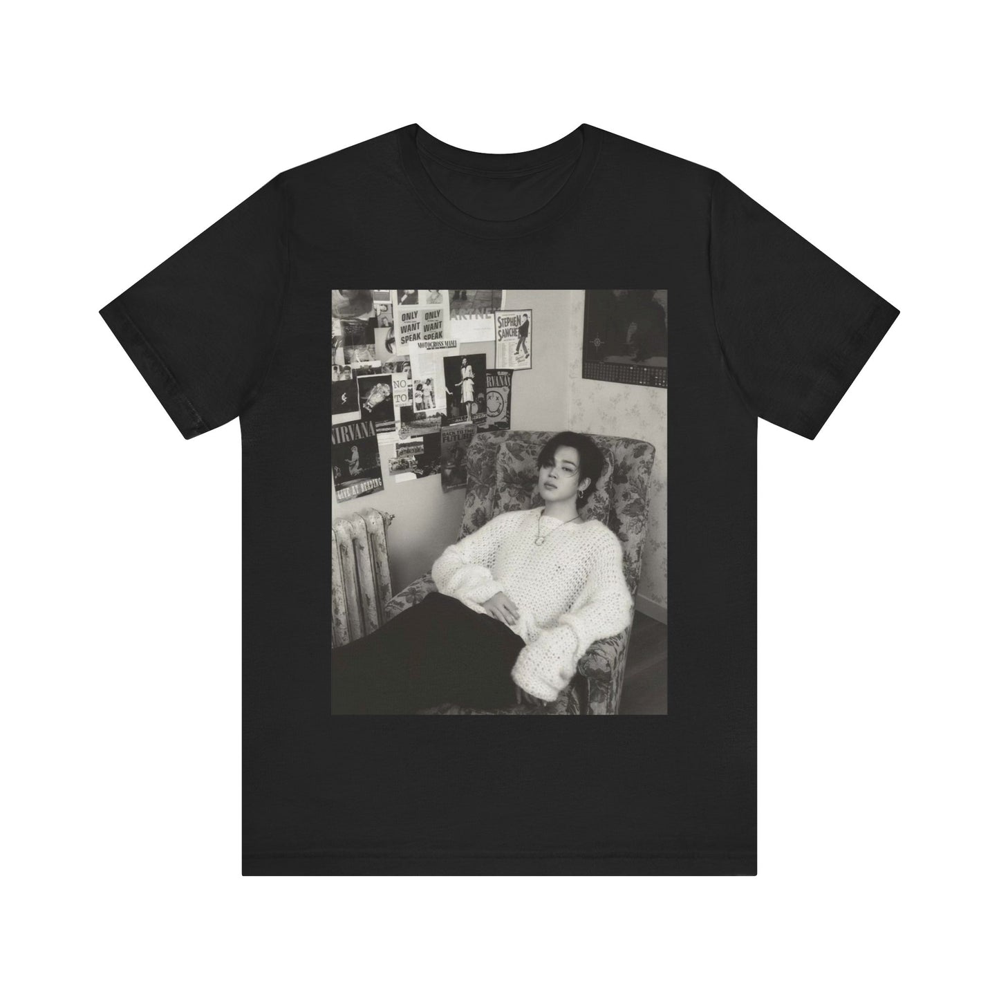 A black graphic t-shirt featuring a black and white portrait photo of Jimin.