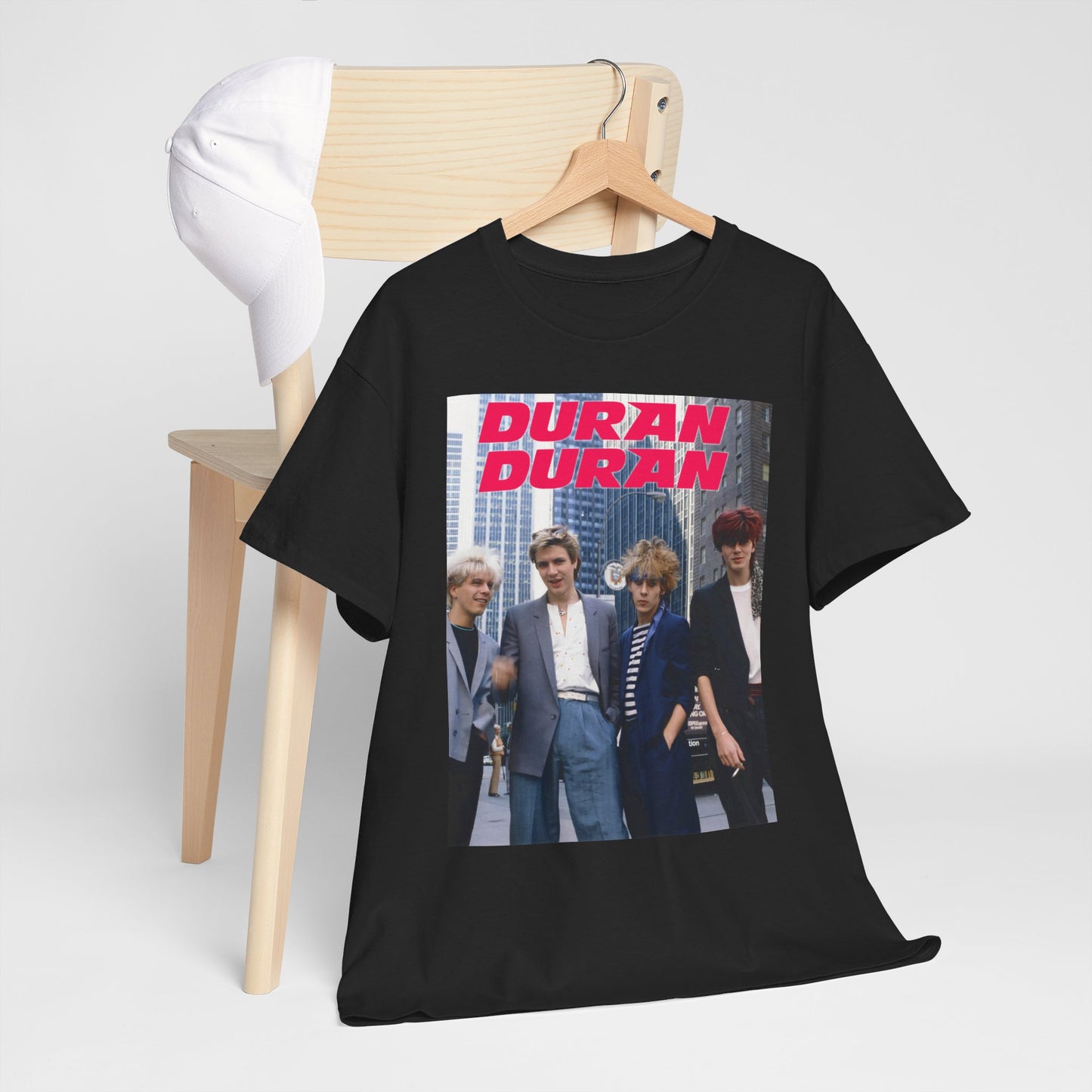 A black graphic t-shirt featuring a vintage 80s new romantic graphic of Duran Duran.