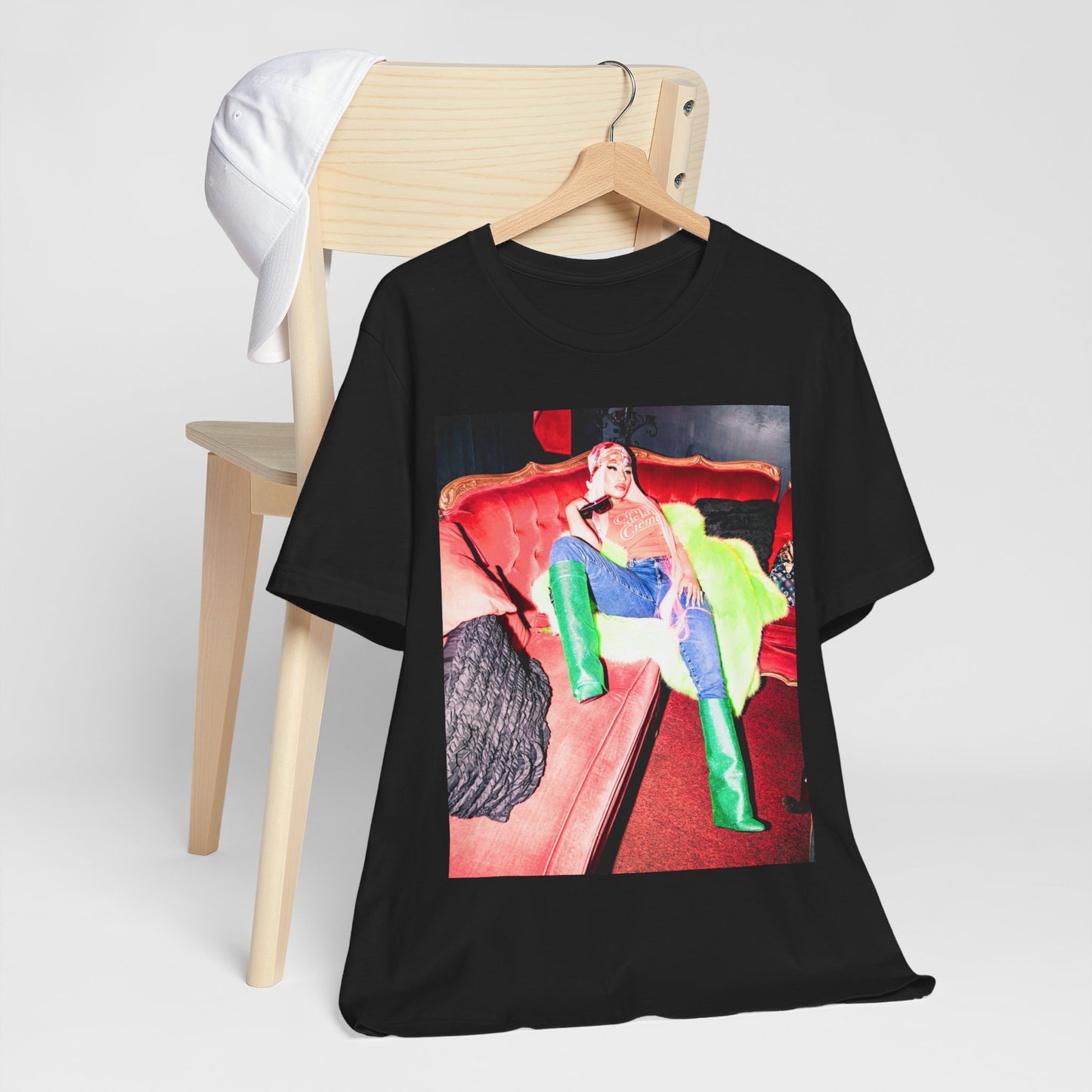 A black graphic t-shirt featuring a retro graphic related to Nicki Minaj's 'Pink Friday' album era.
