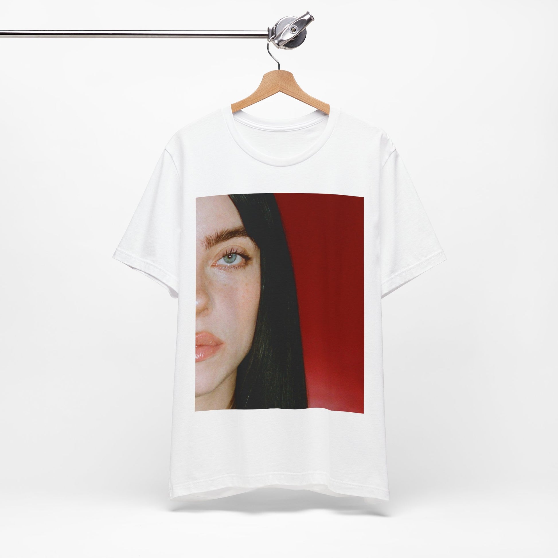 A classic, direct, black and white portrait of Billie Eilish, embodying a timeless aesthetic, printed on a graphic t-shirt.