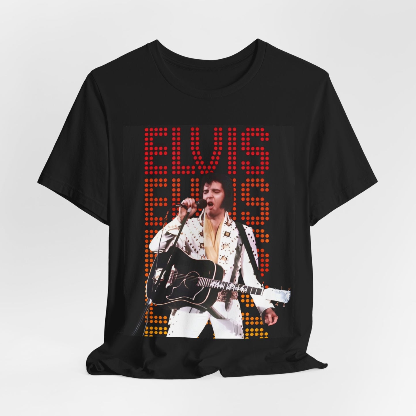 A black graphic t-shirt featuring a graphic related to Elvis Presley's '68 Comeback Special'.