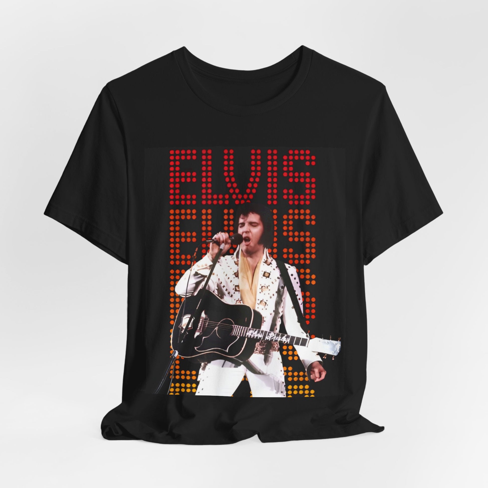 A black graphic t-shirt featuring a graphic related to Elvis Presley's '68 Comeback Special'.