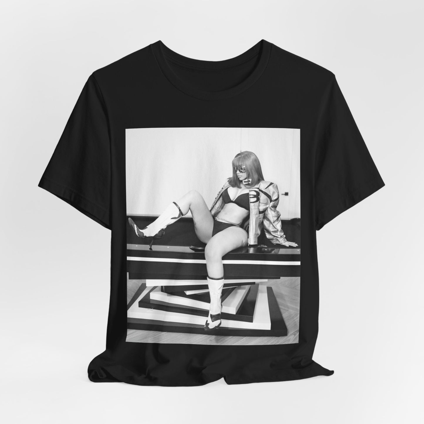 A black graphic t-shirt featuring an artistic or aesthetic graphic of Cardi B in a hip hop style.