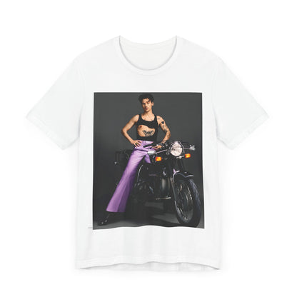 A black graphic t-shirt featuring a graphic of Harry Styles related to motorcycles or a rebellious, cool style.