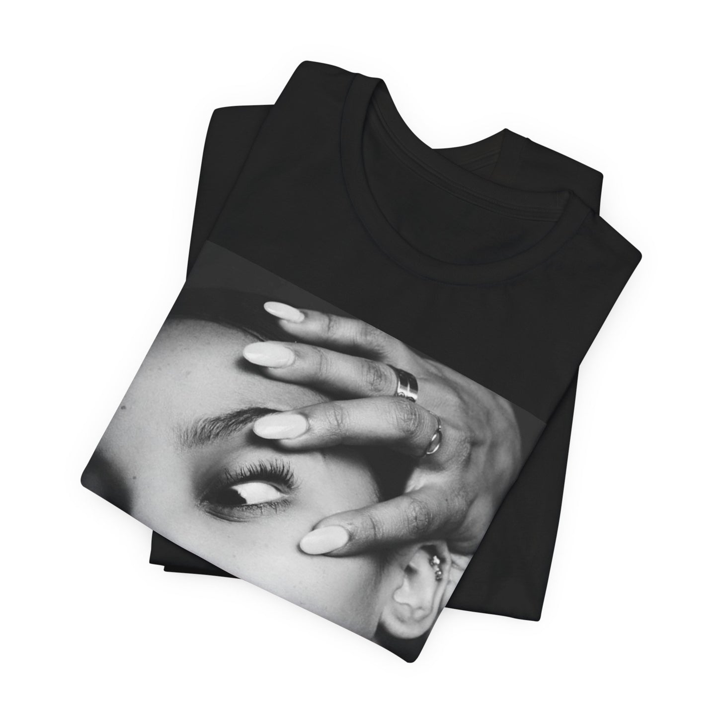 A black graphic t-shirt featuring a black and white, monochrome graphic or photo of Tinashe.