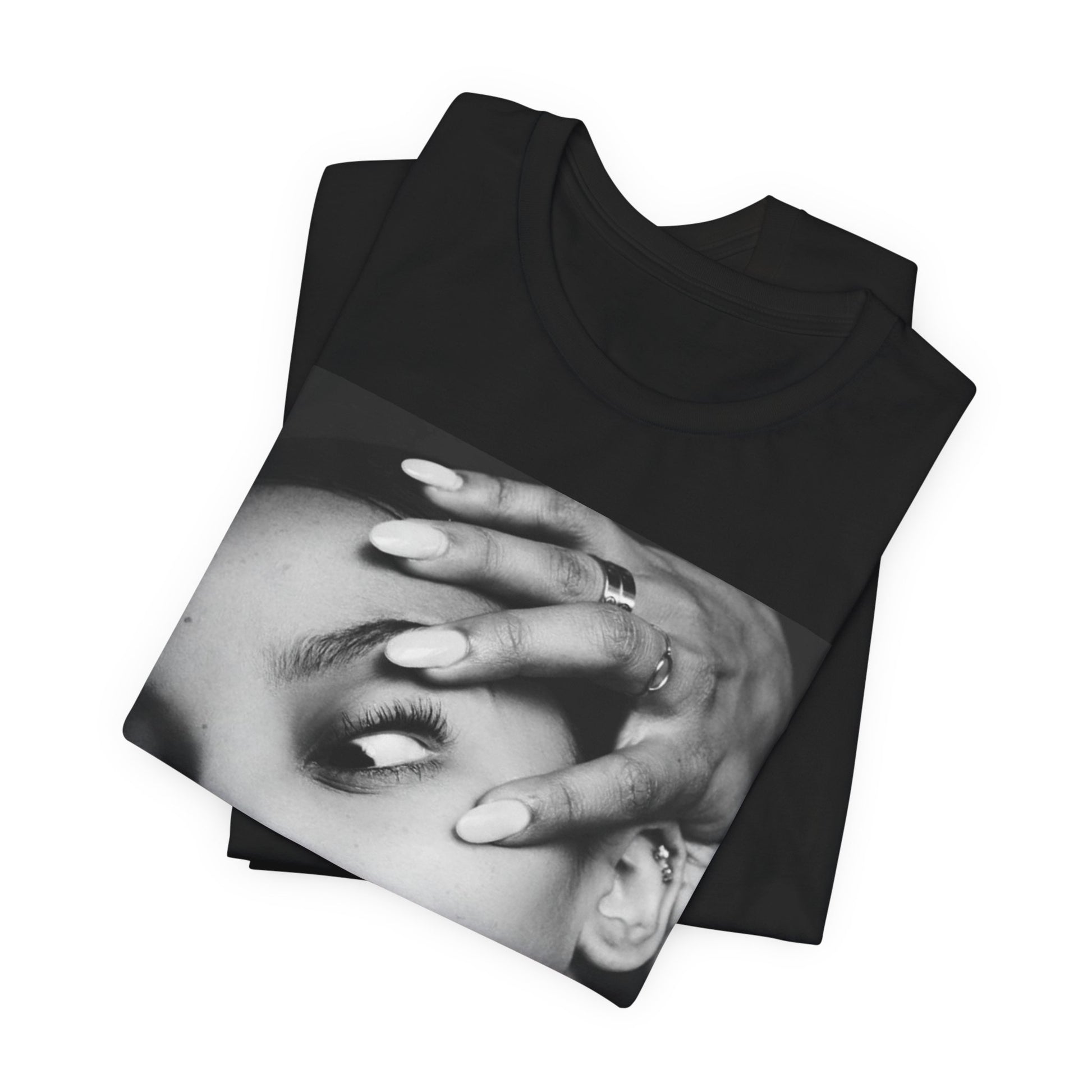 A black graphic t-shirt featuring a black and white, monochrome graphic or photo of Tinashe.