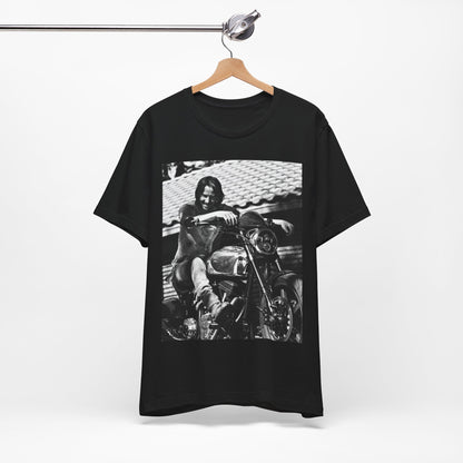A black graphic t-shirt featuring a black and white photo of Keanu Reeves on a motorcycle.