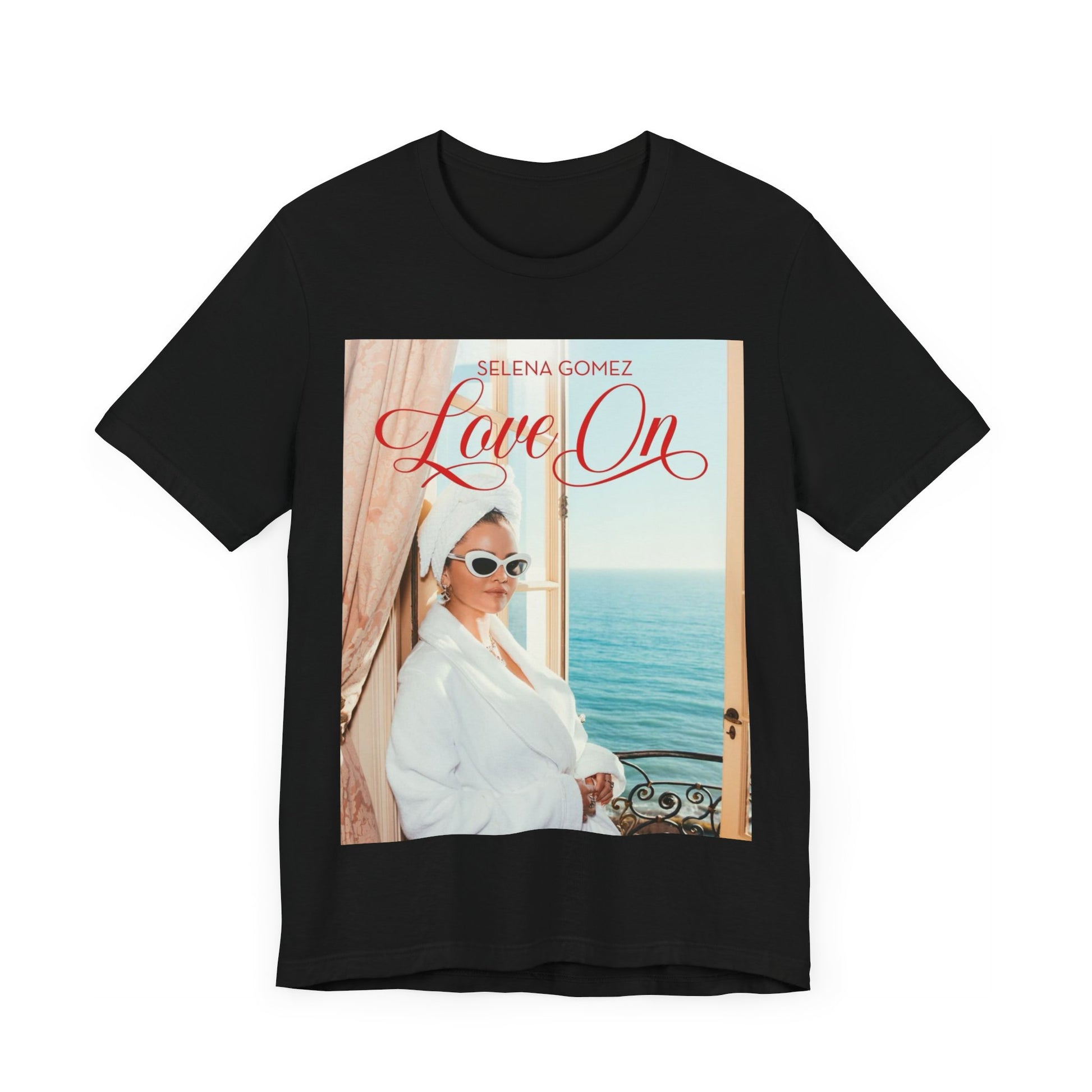 A black graphic t-shirt featuring a graphic related to Selena Gomez's 'Love On' song.