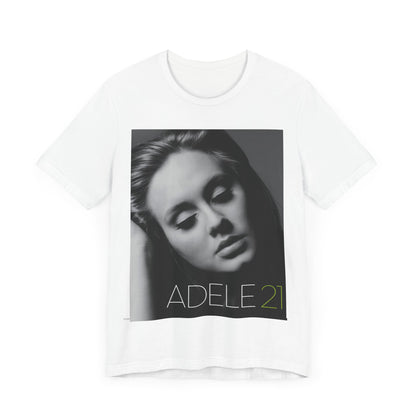 A black graphic t-shirt featuring the album cover art for Adele's '21' album, showing a close-up portrait of her with a contemplative expression.