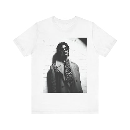 A black graphic t-shirt featuring Prince's iconic symbol, representing 'The Artist Formerly Known As'.