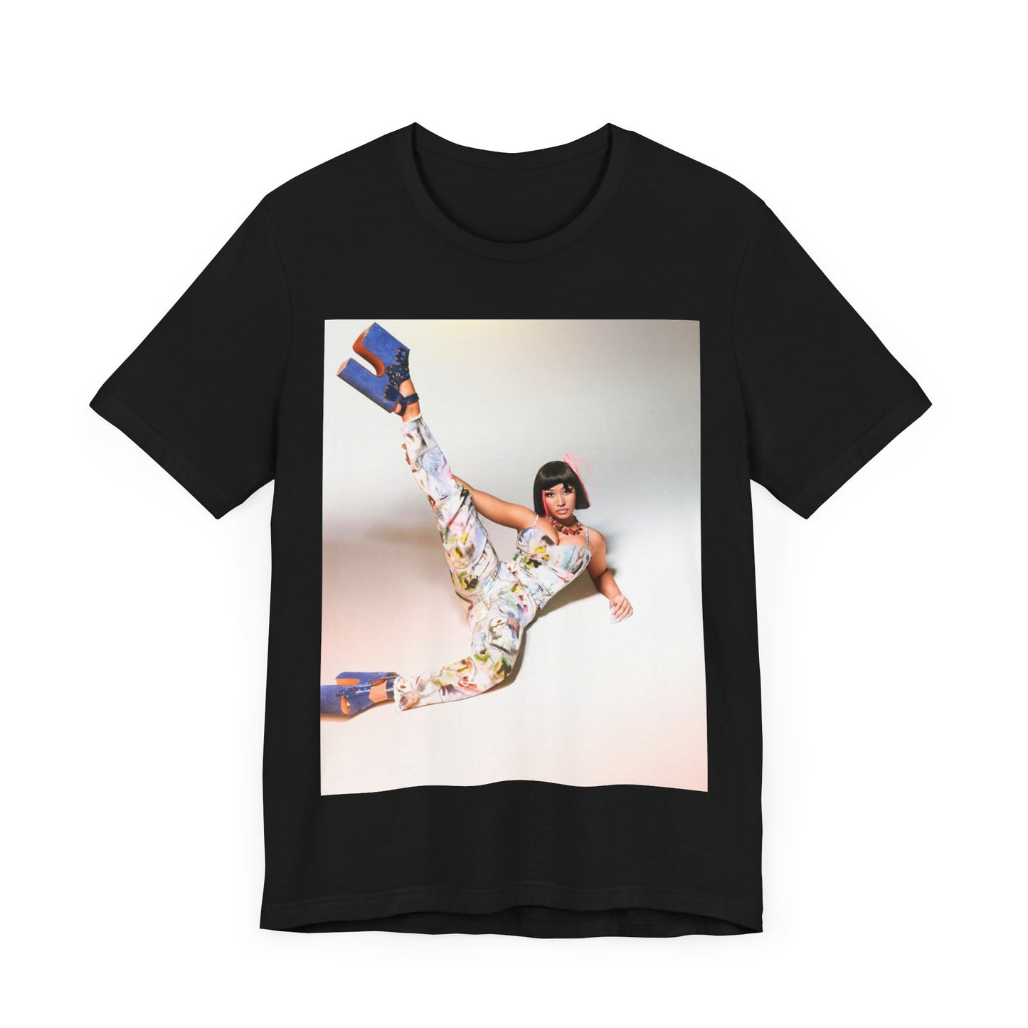 A black graphic t-shirt featuring a graphic of Nicki Minaj as a global fashion rap queen.