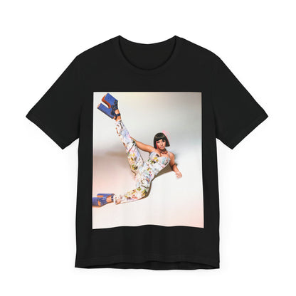 A black graphic t-shirt featuring a graphic of Nicki Minaj as a global fashion rap queen.