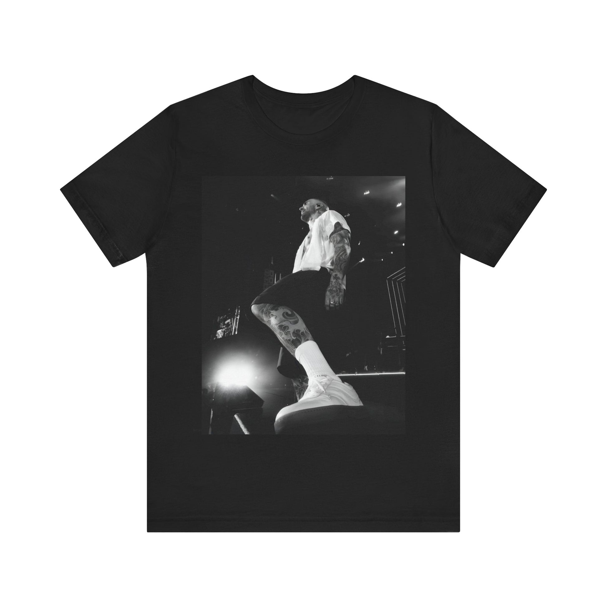 The abstract, geometric 'V' logo from the cover of the Maroon 5 album V, printed on a t-shirt.