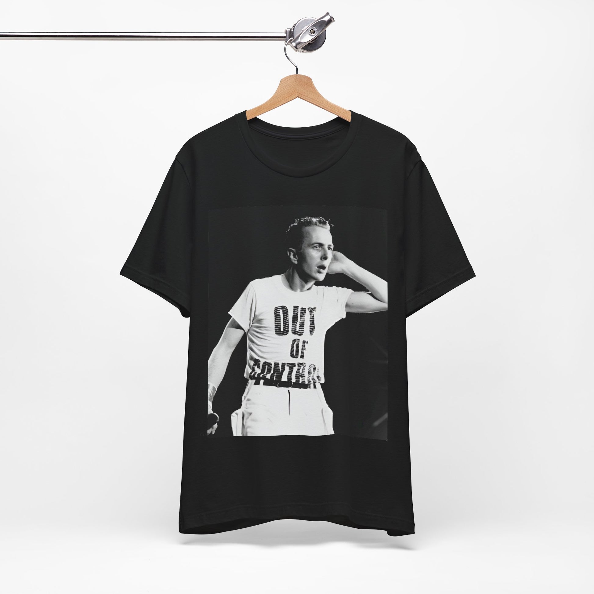 A black graphic t-shirt featuring a black and white graphic or photo portrait of Joe Strummer from The Clash.