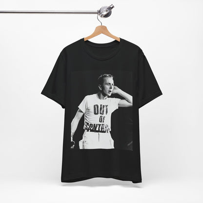 A black graphic t-shirt featuring a black and white graphic or photo portrait of Joe Strummer from The Clash.
