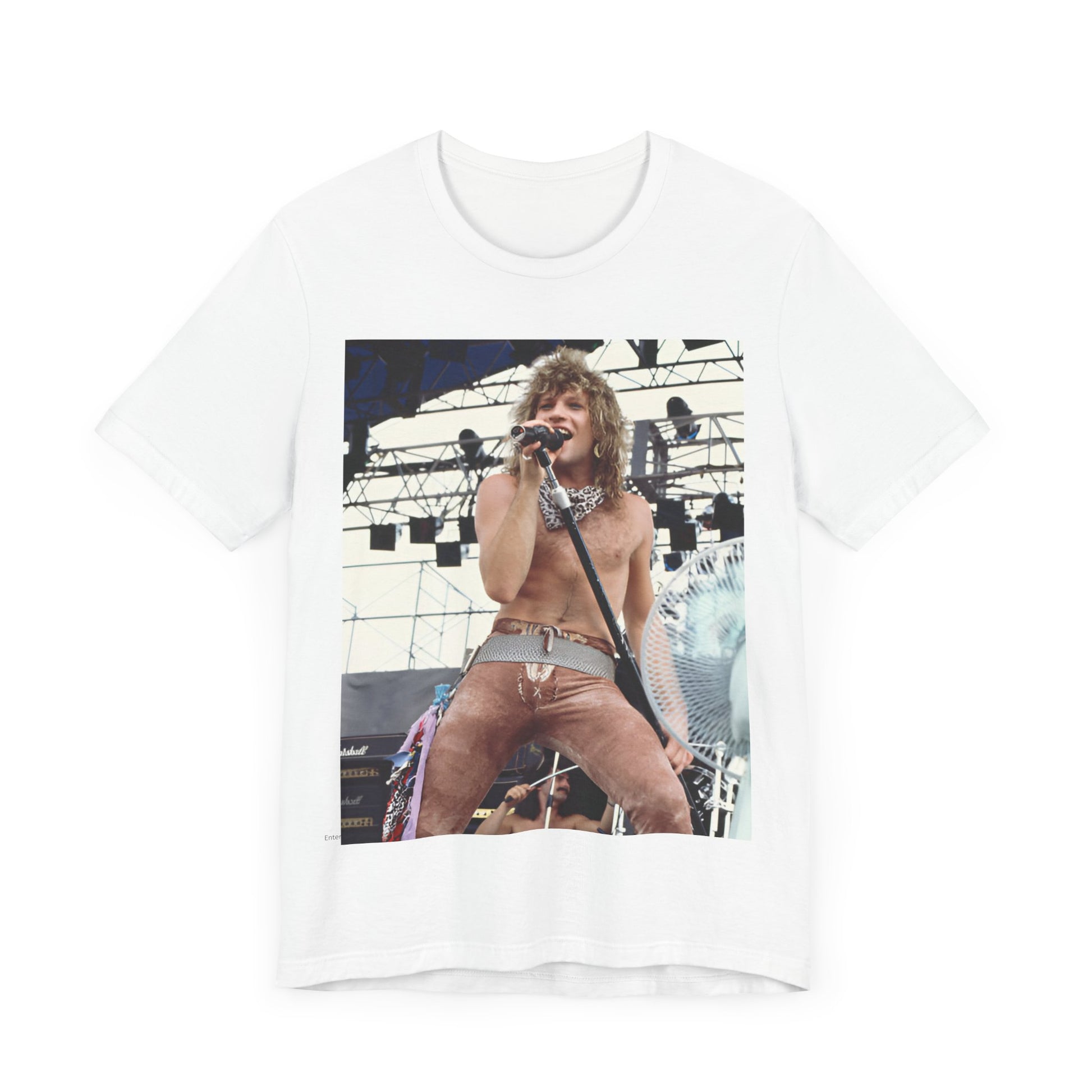 A black graphic t-shirt featuring a dynamic graphic or photo of Bon Jovi performing live on stage with a fierce intensity.
