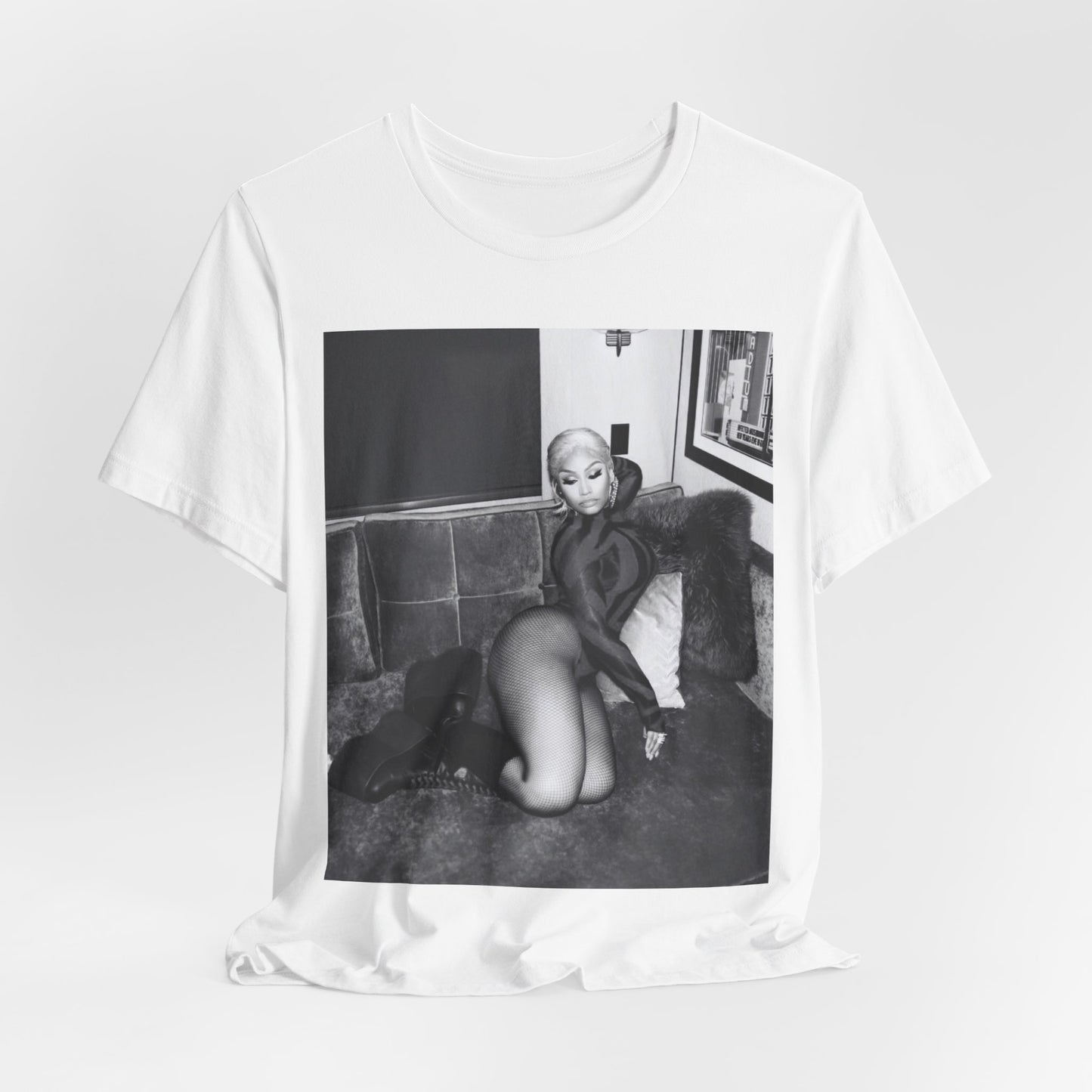 A black graphic t-shirt featuring a fierce black and white glamour graphic of Nicki Minaj.