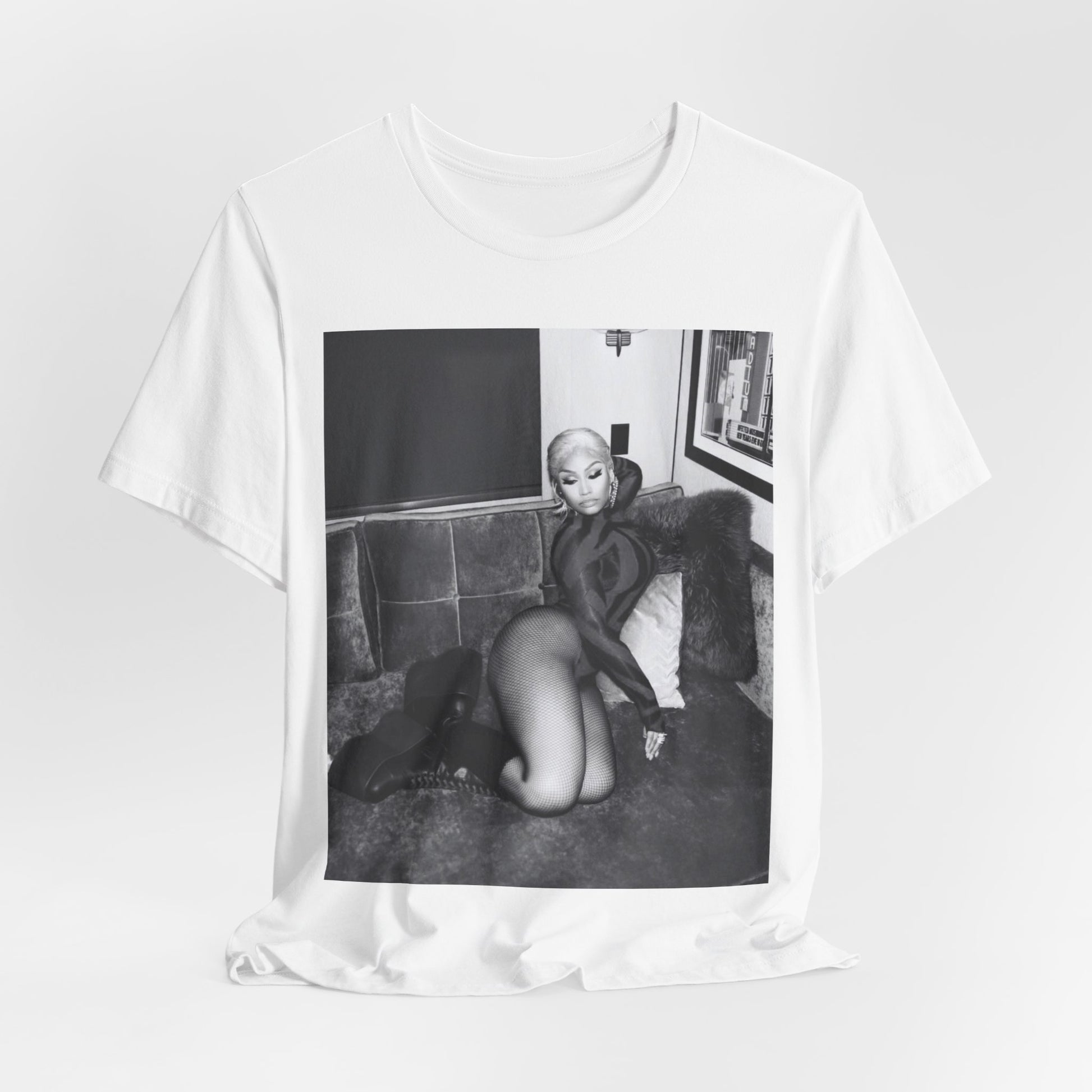 A black graphic t-shirt featuring a fierce black and white glamour graphic of Nicki Minaj.