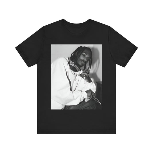A black graphic t-shirt featuring a black and white hip hop graphic or photo of Snoop Dogg.