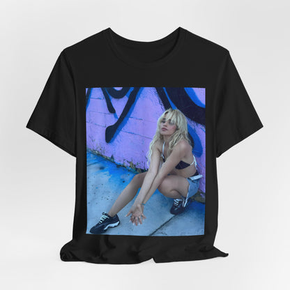 A black graphic t-shirt featuring a photo of Camila Cabello from her "Romance" album era.