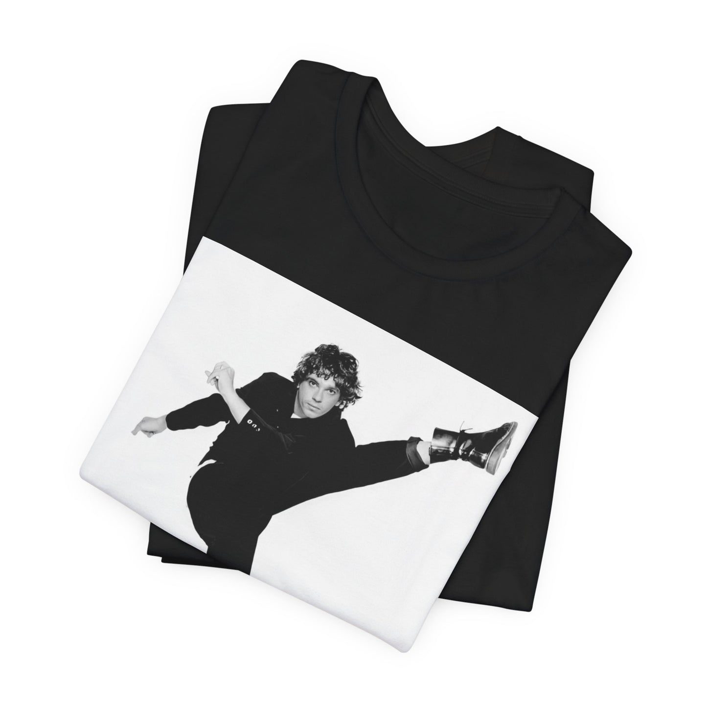 A black graphic t-shirt featuring a retro graphic related to INXS's 'Kick' album era.