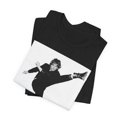 A black graphic t-shirt featuring a retro graphic related to INXS's 'Kick' album era.